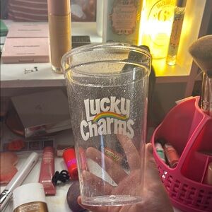Lucky Charms Clear Plastic Cup with flavored lip, balms, and lip glosses no lid